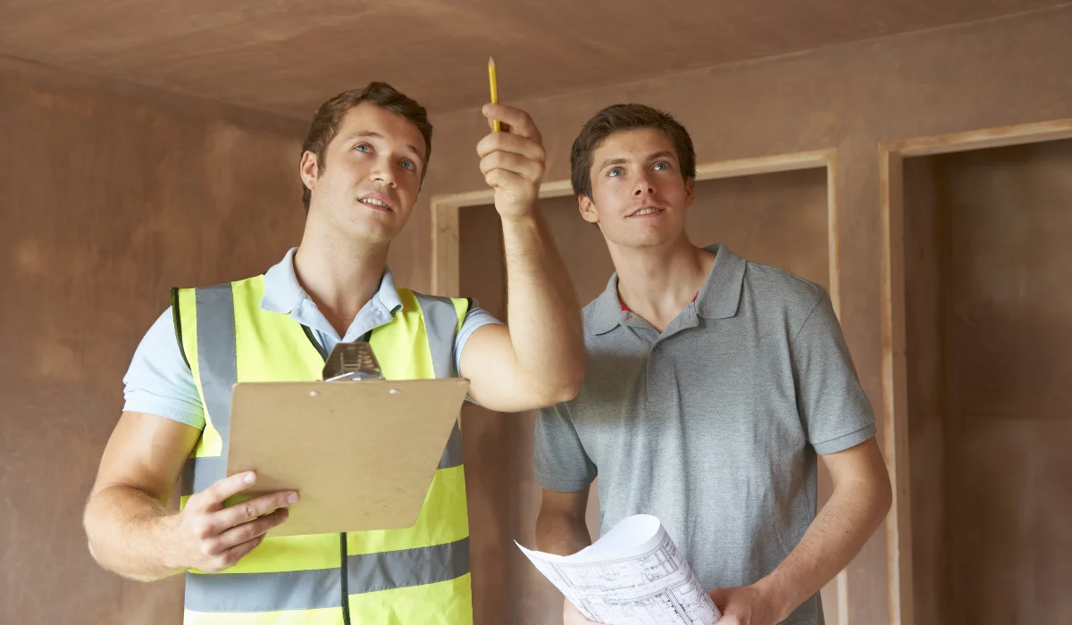 Inspector assessing key systems during a 5-point home inspection in Hamilton